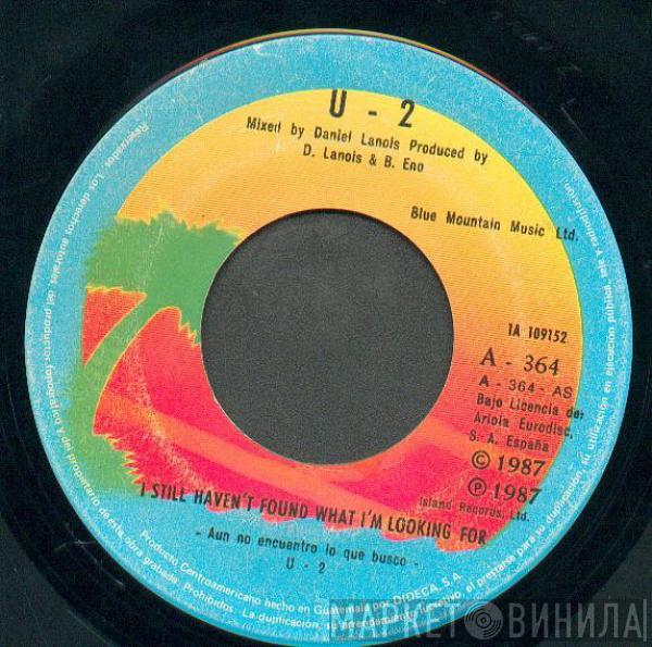  U2  - I Still Haven't Found What I'm Looking For = Aun No Encuentro Lo Que Busco