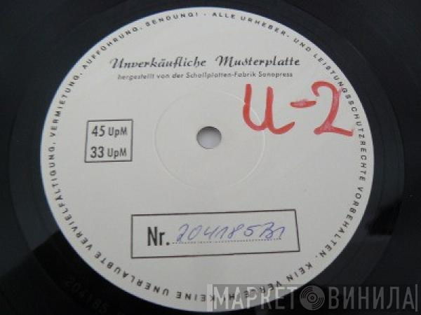  U2  - October