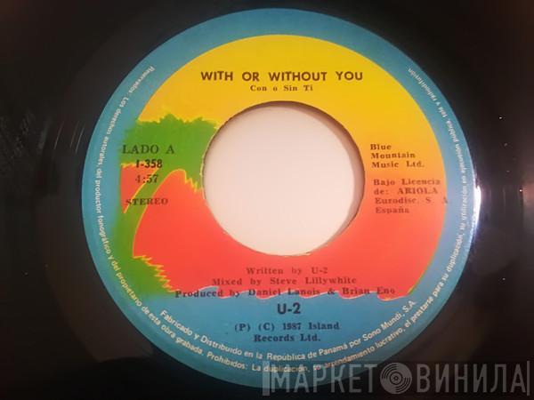  U2  - With Or Without You = Con O Sin Ti