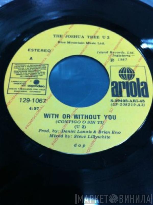  U2  - With Or Without You = Contigo O Sin Ti
