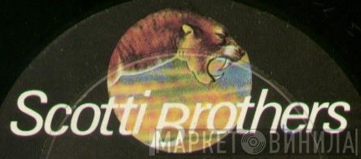 Scotti Bros. Records - Винил CD и Кассеты лейбла Scotti Bros. Records на сайте МаркетВинила