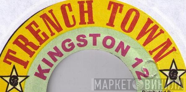 Trench Town Kingston 12 - Винил CD и Кассеты лейбла Trench Town Kingston 12 на сайте МаркетВинила